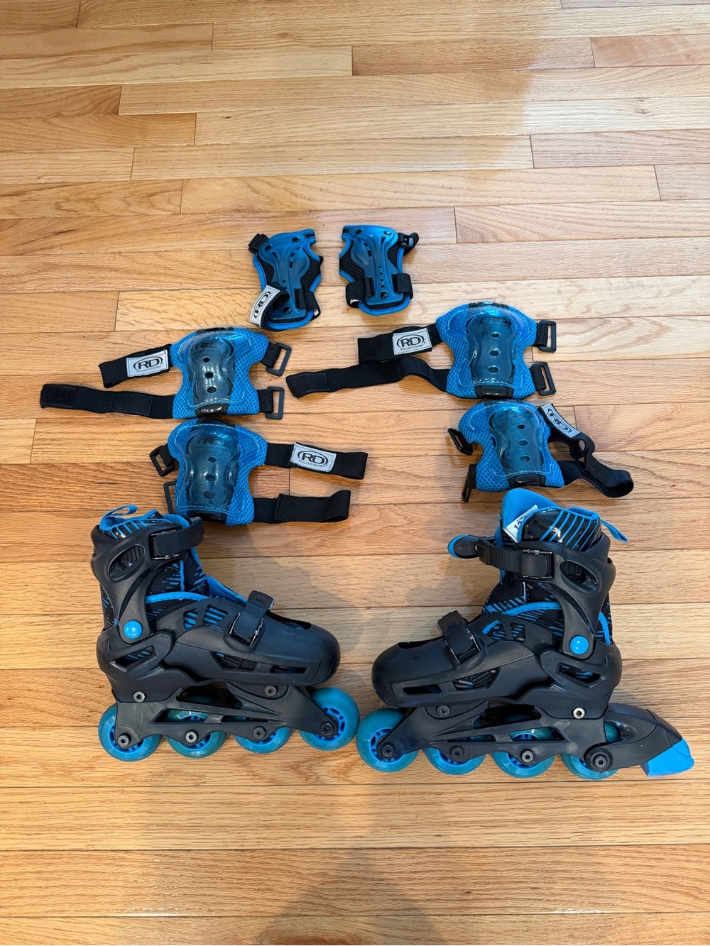 Adjustable Kids Inline Skate Set with Blue Protective Pads